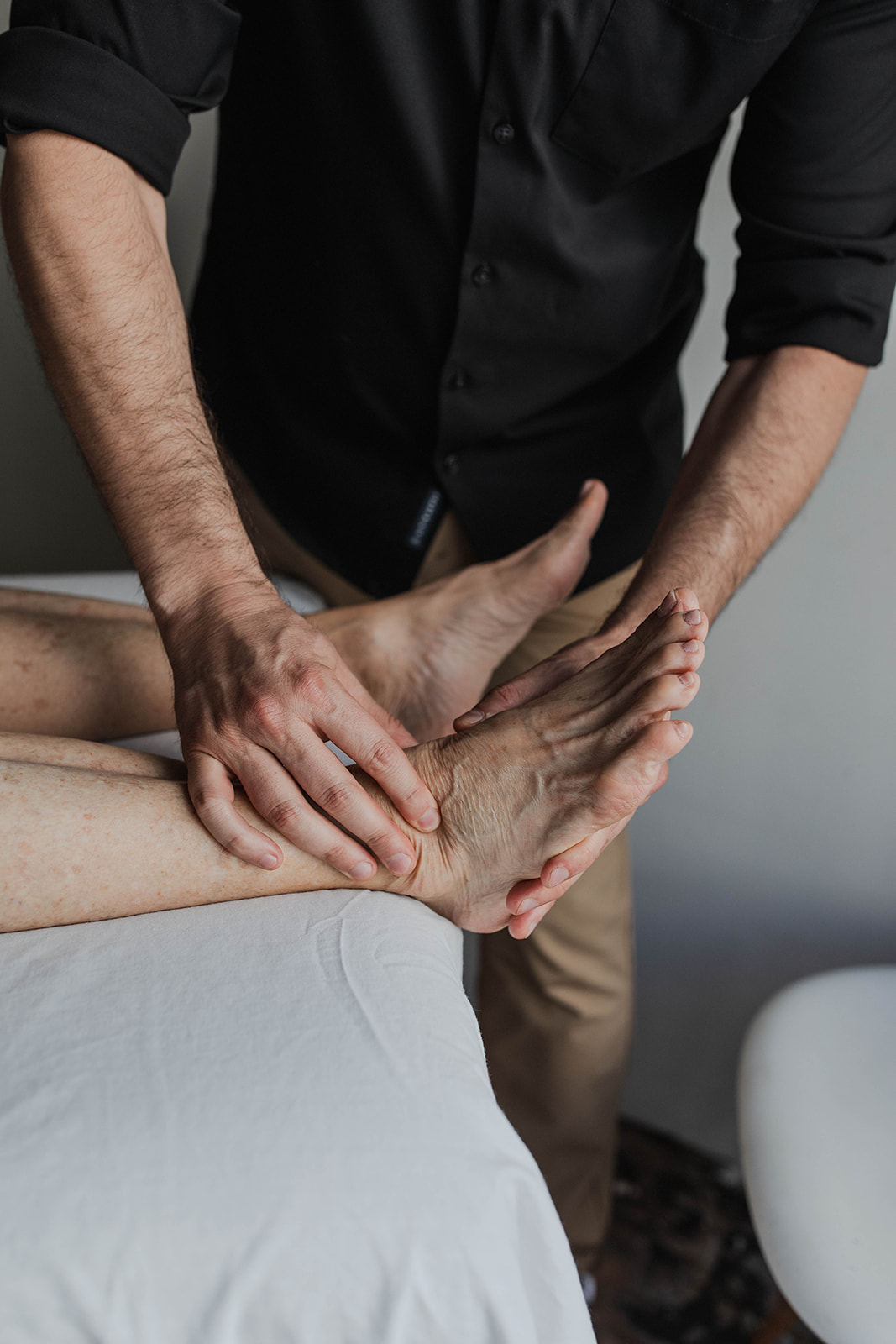 Hands-on Rolfing work with a client